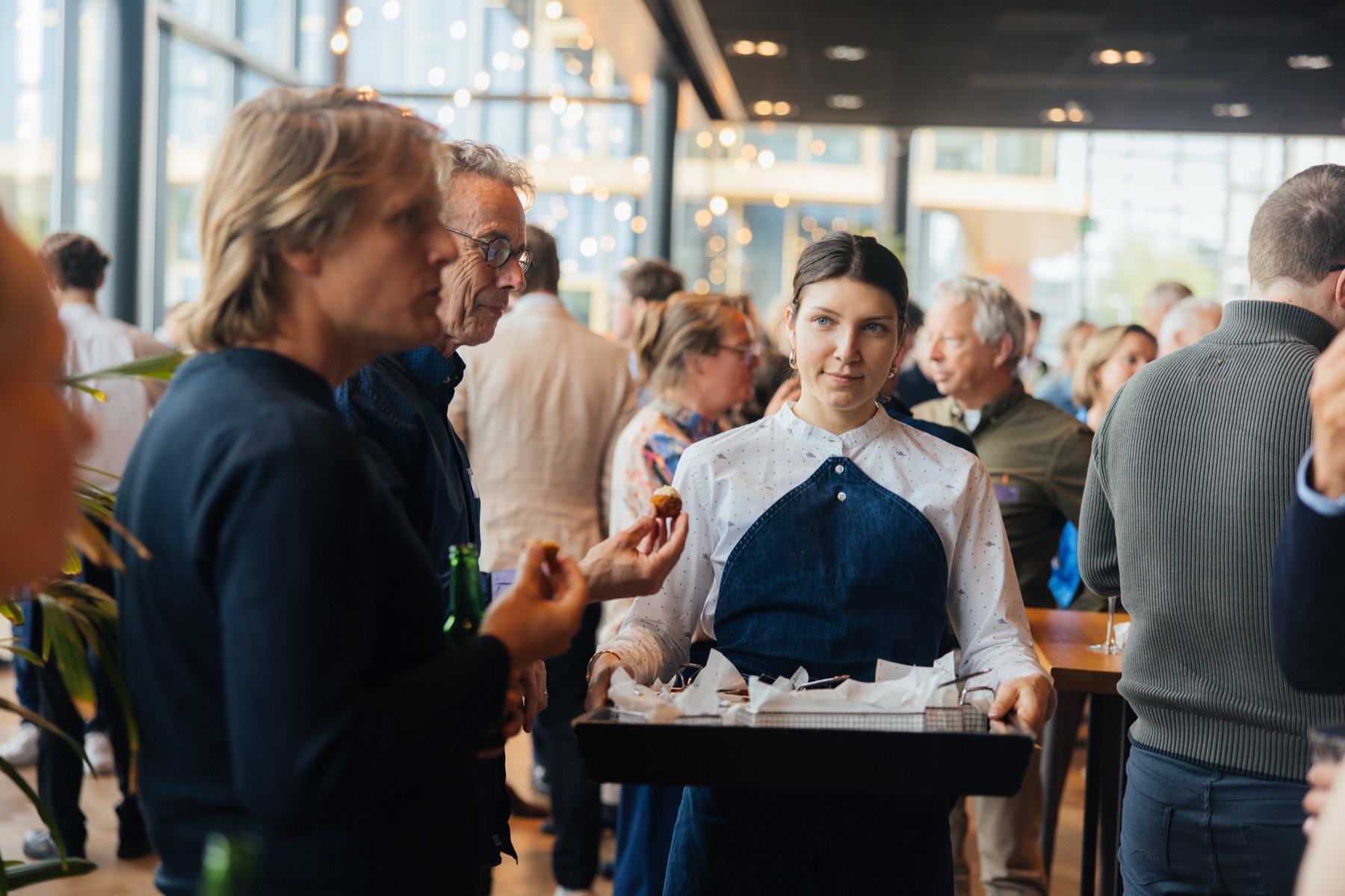 Guests talking during a networking reception