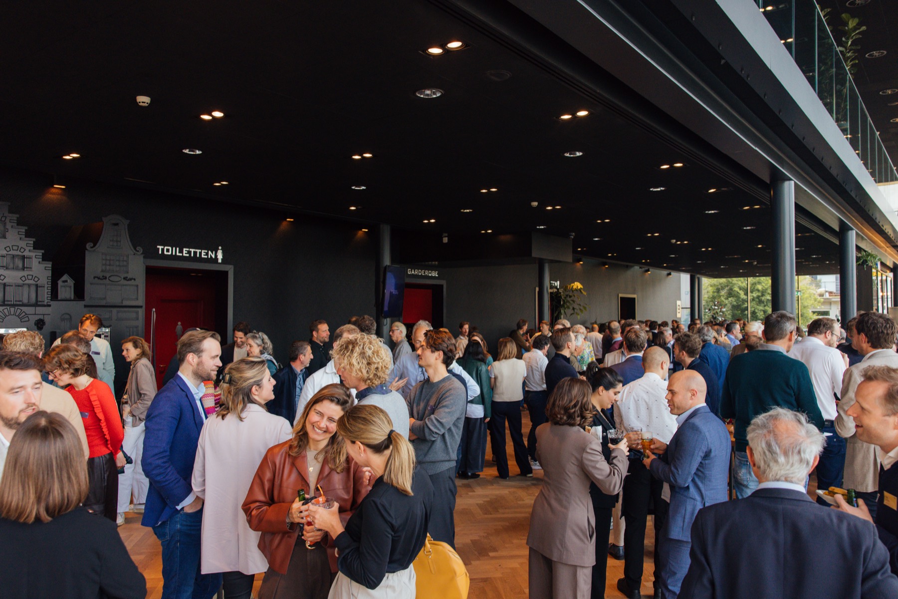 Busy foyer during a conference break