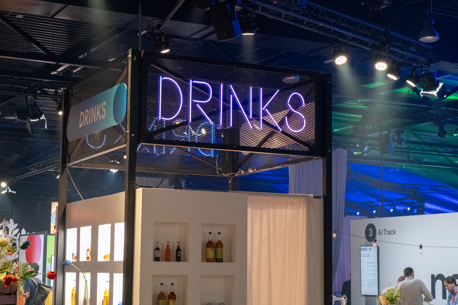 Snacks and drinks stand with fresh croissants at a conference