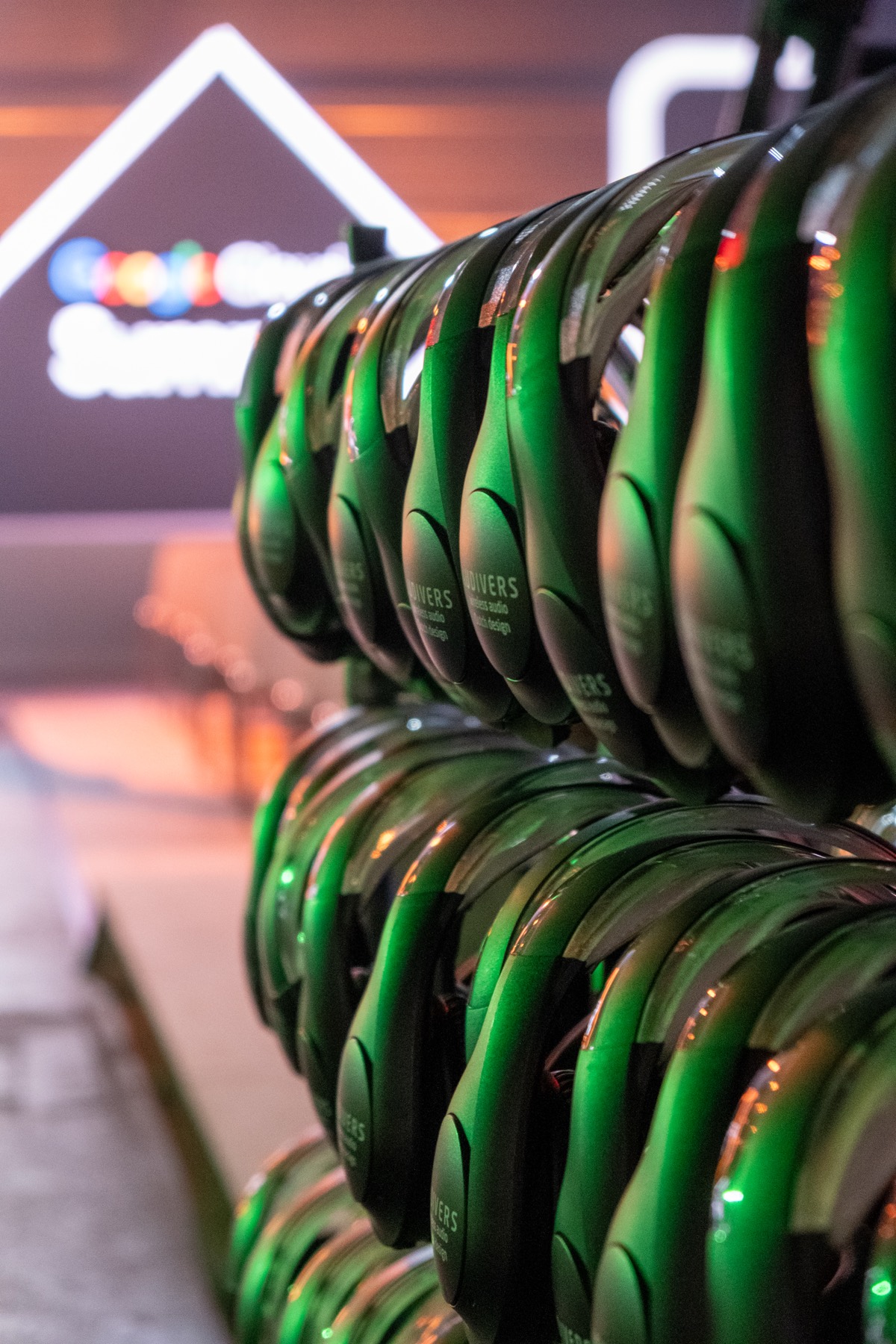 Display wall of headphones at a tech summit